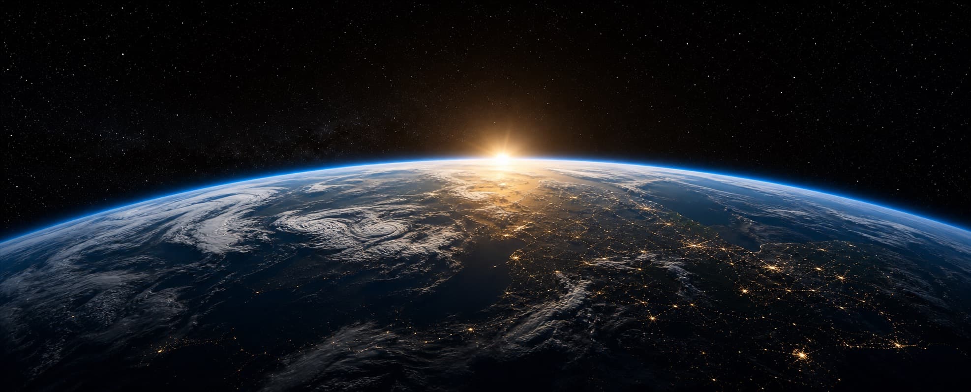 Earth horizon at sunrise with city lights and atmosphere